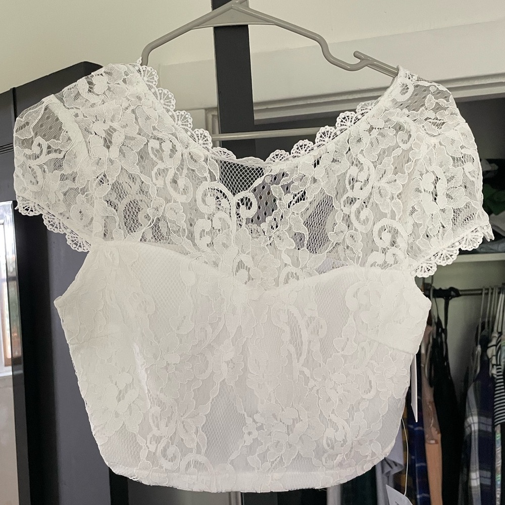 Small Lulus white lace zip up (back) crop top. Never worn.